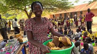African villige school kids having breakfast at school. P
