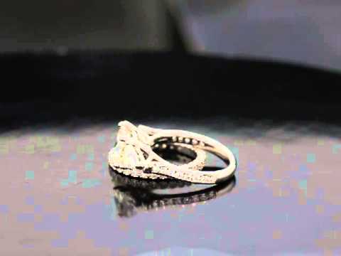 A.V. Three Stone Ring with Channel Set Side Stones