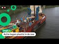 Kinderen varen rond met enorm kunstwerk van vispluis