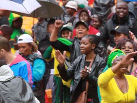 Crowd singing at Nelson Mandela’s memorial service