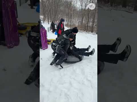 Officer flies out of inflatable tube in hilarious video