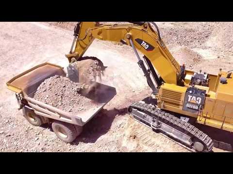 Caterpillar CAT 6015B Excavator LOADING 100 TON HAUL TRUCKS EXTREME MACHINES IN REVERSE VIDEO WORK