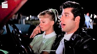 Grease: Alone at a drive-in scene