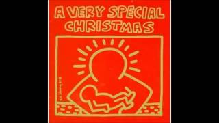 Madonna - "Santa Baby" - A Very Special Christmas (1987)