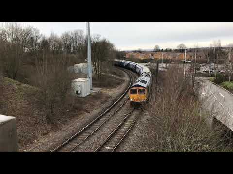 Colourful shed 66 720 coasts through Ashton north on 6M51
