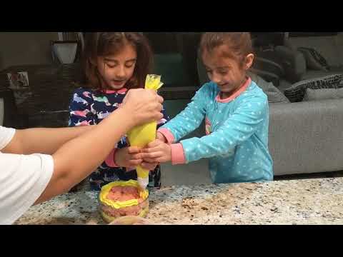 Raashi and Ritika making a birthday cake