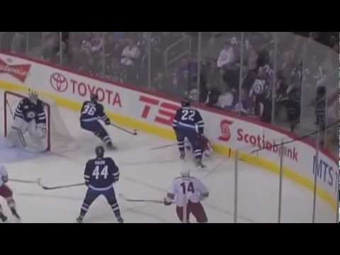Chris Thorburn drills Lauri Korpikoski