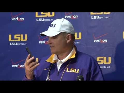 Les Miles Answers Reporter's Phone During Presser