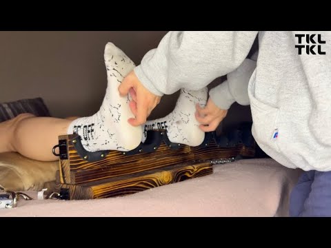 Girl boots removed and socks tickled