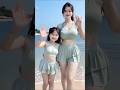 Charming Young Mom With Cute Baby At The Beach Relaxing Coastal Walk