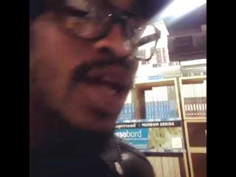 Kid Middi fooling with zera in art store