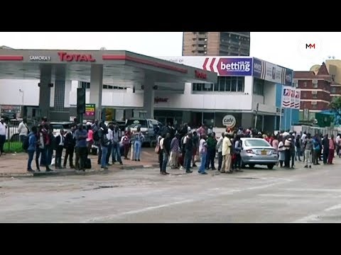 'I don't know how I'm going to get home' Zimbabweans outraged over fuel price hike