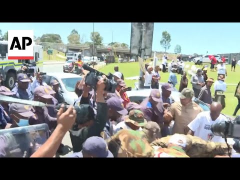 Police clash with protesters in Soweto, near the G20 summit venue