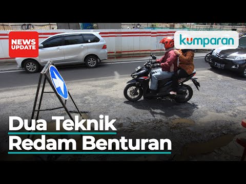 Terpaksa Menghajar Lubang di Jalan Ketika Naik Motor, Cara Amannya Gimana?