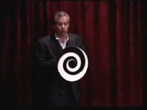 Magic Circle Close Up Champion Performing Shrinking Head Illusion