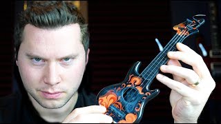 Video thumbnail for My New $1 Guitar by Music is Win