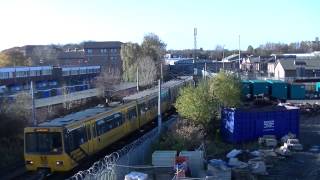 preview picture of video 'Tyne and Wear Metro-Metrocars 4002 and 4009 passing Gosforth Depot East Yard'