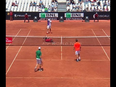 Tennis player takes partner out with a brutal serve to the head