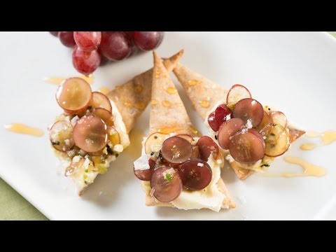 House-Made Crackers Topped with Spicy Red Grapes, Mascarpone, and Honey