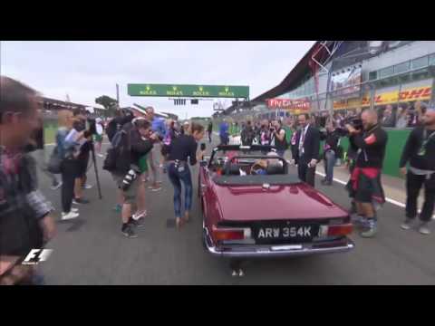 Natalie Pinkham tries to interview Sebastian Vettel on the British GP Drivers' Parade