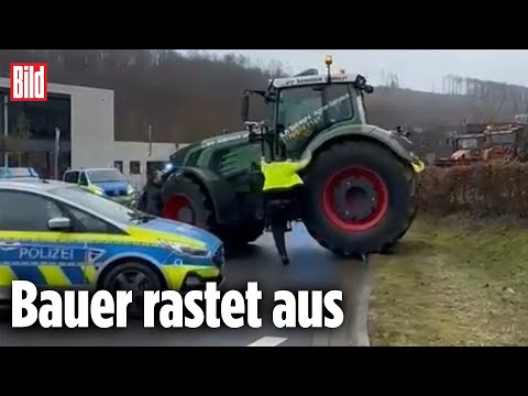 Traktor durchbricht Polizei-Sperre