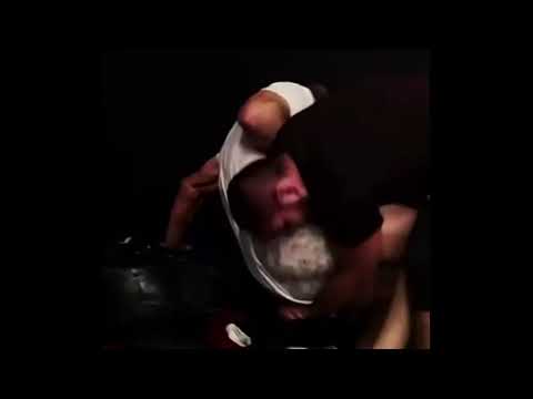 Khabib Nurmagomedov talking to Luke Rockhold while sparring