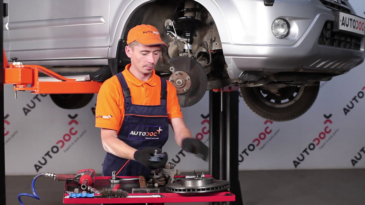 Como mudar discos de travão da parte dianteira em Honda CR-V II - guia de substituição