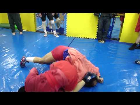 袈裟固⇒回転腕十字