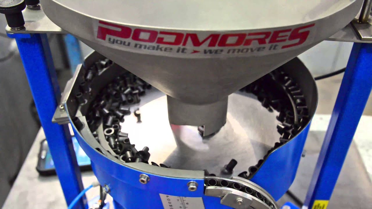 Podmores vibratory bowl feeder handling plastic bushes