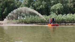 Conver C485 mowing boat with a dredge pump