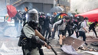 video: Hong Kong police fire tear gas as protesters try to escape besieged university