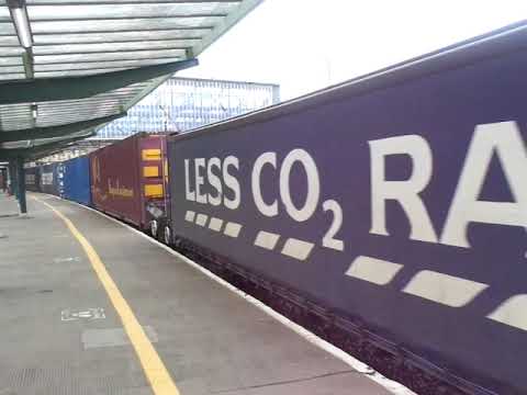 The Class 88 DRS No.88001 'Revolution' with Rail Containers was now moving and leaving at Carlisle.