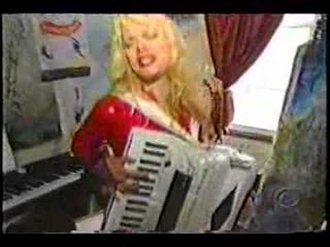 Phoebe Legere Paints Huge Nude Woman! then plays piano with leg behind her head!