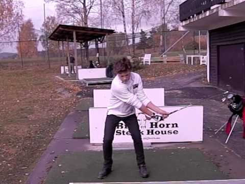 Phillip Berggren 13 years old, 7 iron at Bogstad Oct 2010 front view