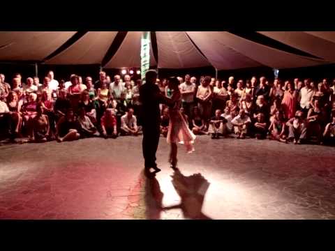  Alejandra Hobert  and  Adrian Veredice  are  dancing  to  "  Garua  "  at  Catania Tango Festival  in  2013