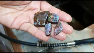 Watch as Miki shows every step of cutting boulder rough opals !