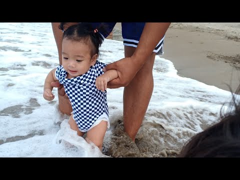 my baby swim at the beach