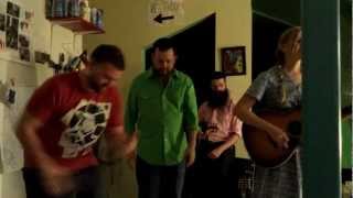 Nora Jane Struthers and the Party Line play body percussion on "Travelin' On"