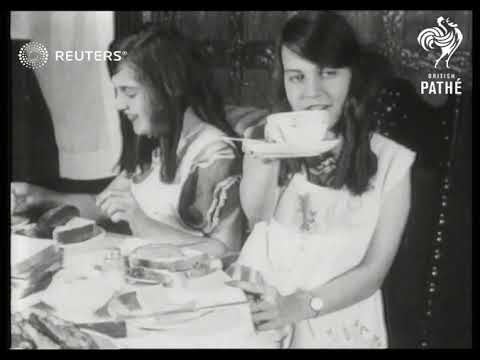 Siamese twins performing household tasks (1924)