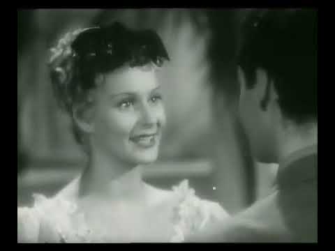 Il Prof. Marini (Andrea Checchi) la tocca piano ad Anna Campolmi (Alida Valli)