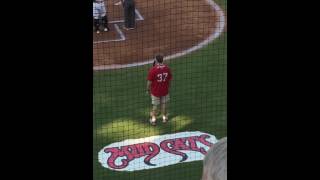 Mark Ream singing the National Anthem at the Mudcats
