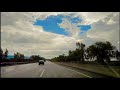 Journey Through Nature's Canvas Trees and Sky on the Highway