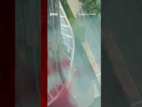 Debris falls after plane hits Beijing's tallest building. #BBCNews