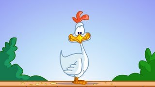 Une poule sur un mur, qui picore du pain dur