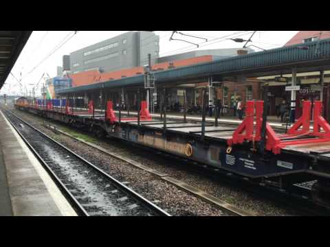 (4K) 66070 Passes Doncaster with a steel train -  10/5/16.