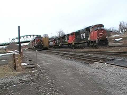 CP 246 arrives in  Fort Erie while CN 339 uncouples it's third engine!