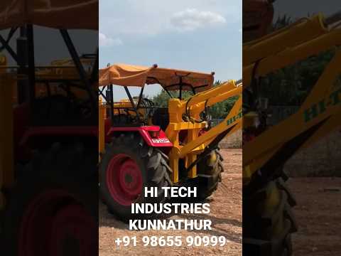 AUGER ATTACHMENT IN BULL TRACTOR