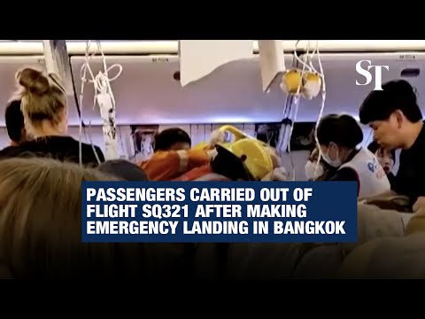 Passengers carried out of flight SQ321 after making emergency landing in Bangkok