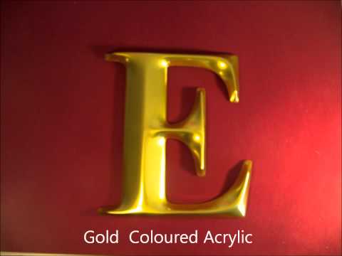 Gold Moulded Letters In Times Bold Bevel Face.