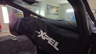 Window Tinting a Tesla Cybertruck with Xpel Ceramic Window Film including the Whole Windshield.